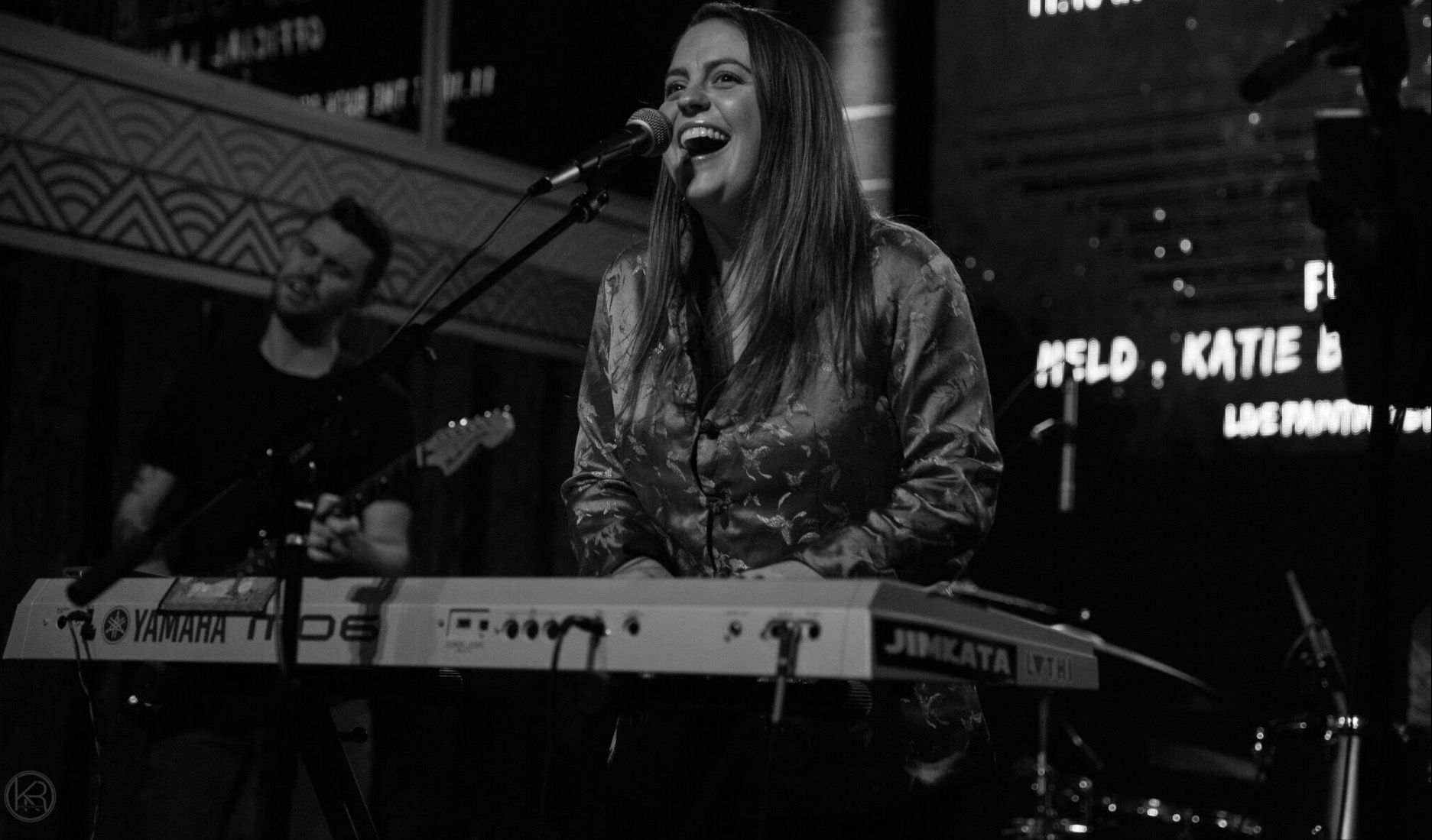 Melanie b and w perform.jpg